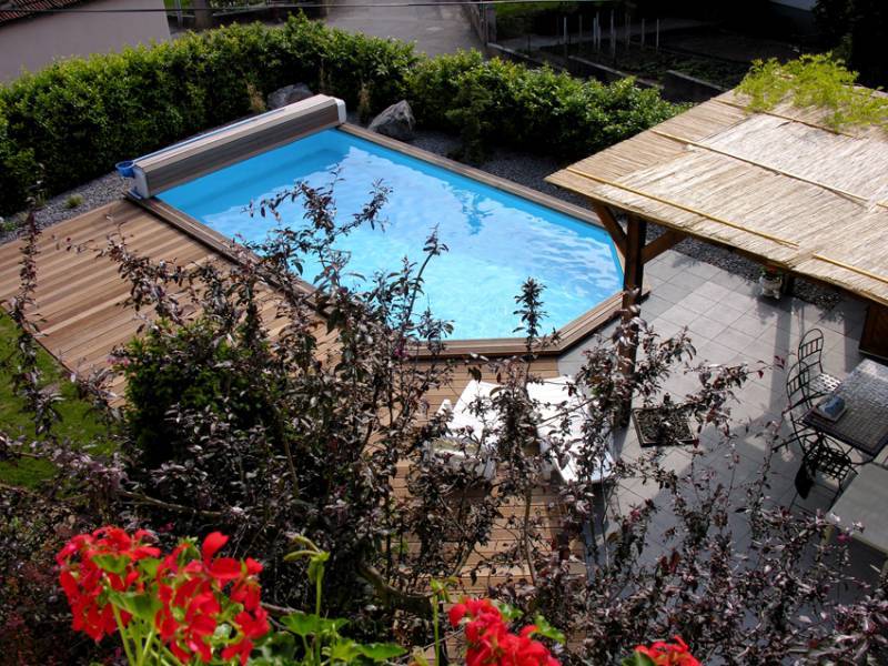 Paysagiste spécialisé dans la mise en place de piscine bois à Colmar en Alsace 